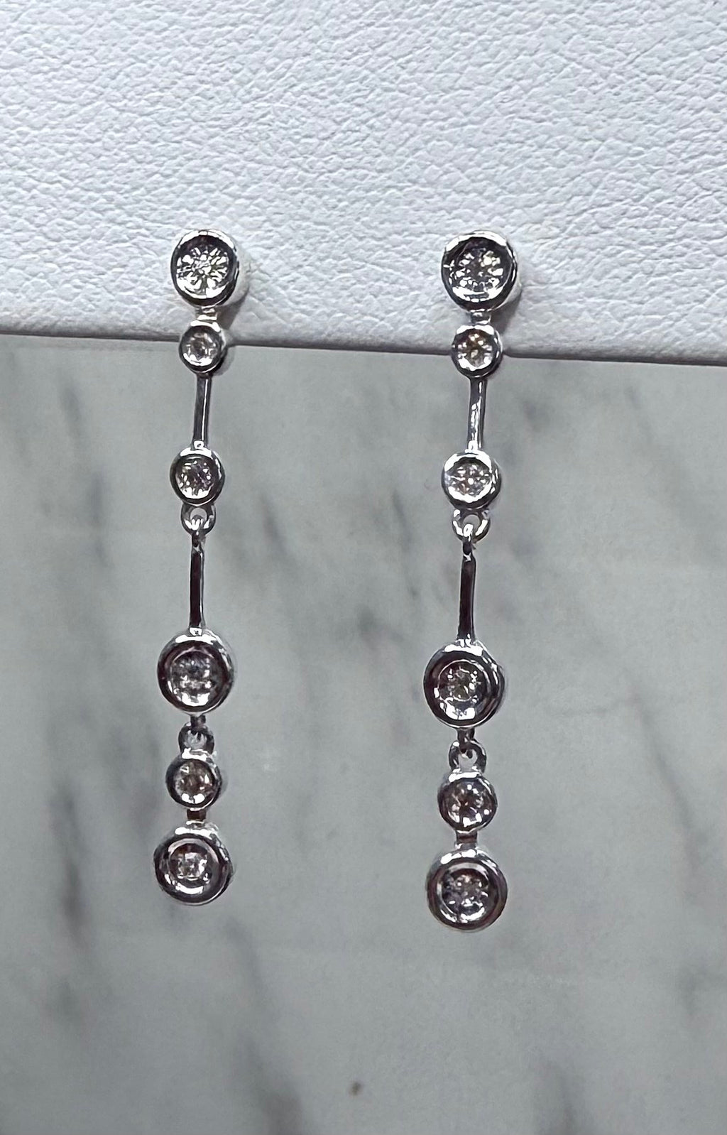 Sterling Silver Bezel Set Diamond Dangle Earrings - Sterling Silver | Greco Jewelers - detail view