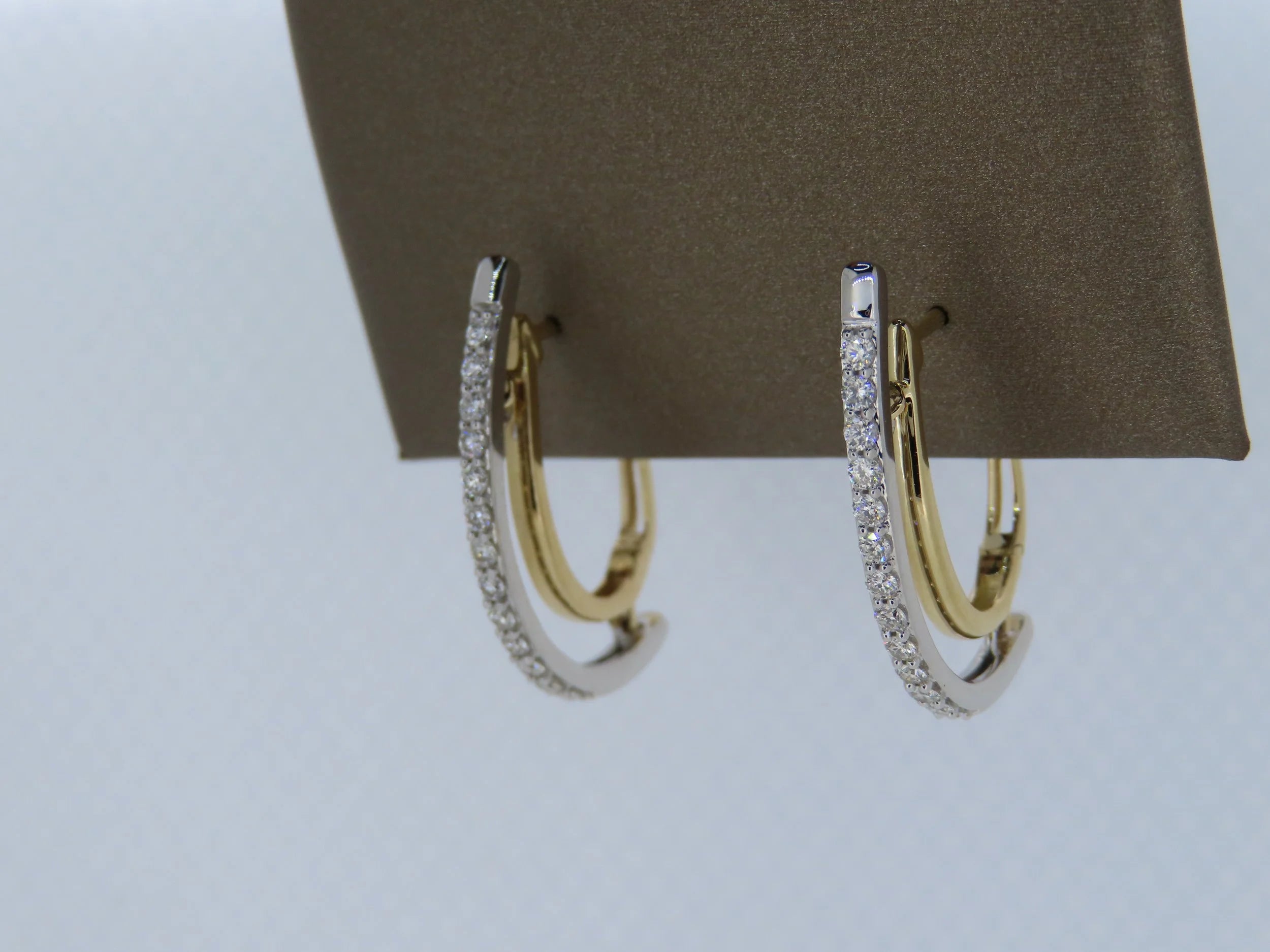 Two-toned diamond swivel hoop earrings - Two-Toned Gold | Greco Jewelers - detail view