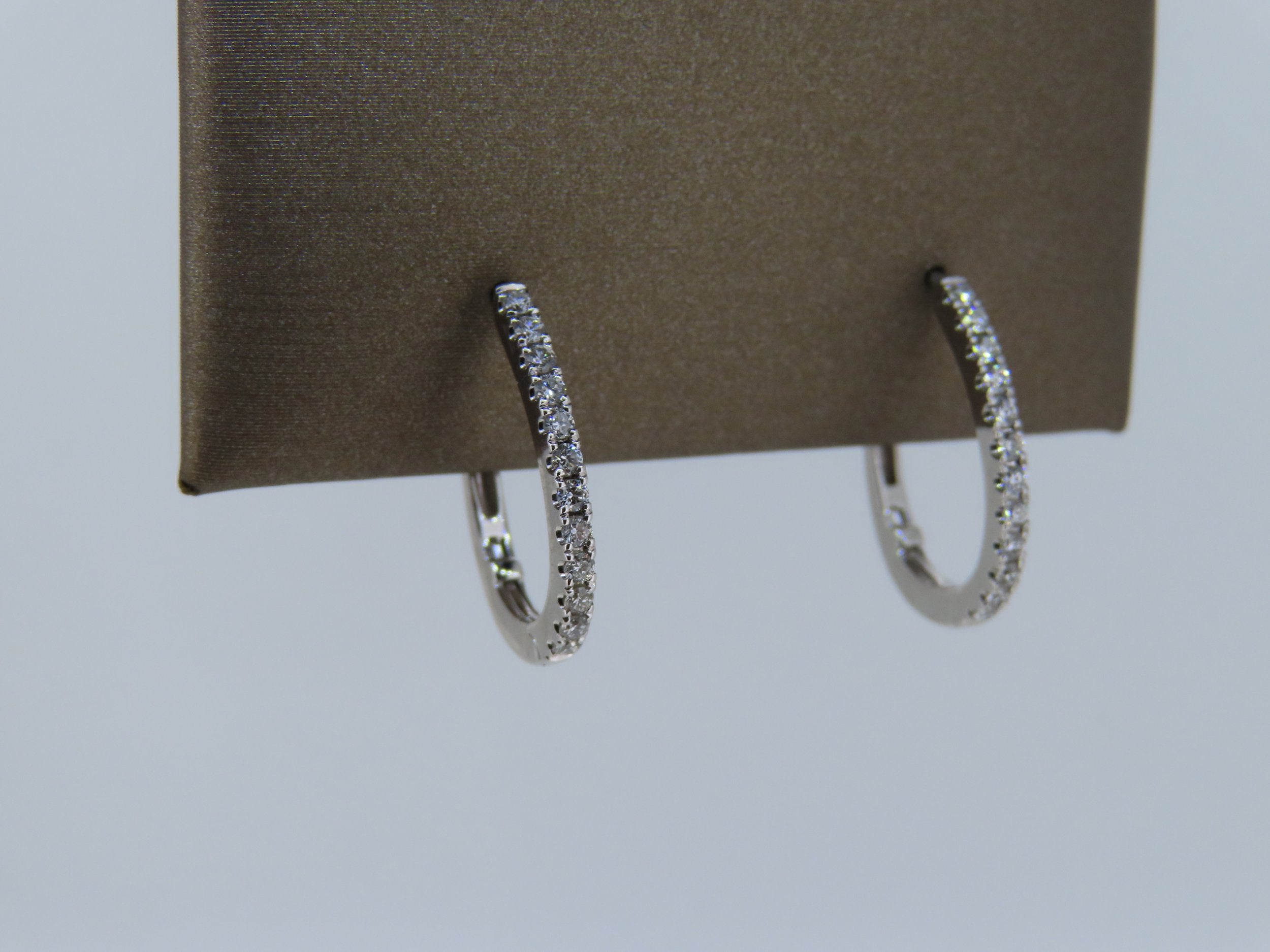 Diamond Oval Hoops - hoop earrings | Greco Jewelers - styled view