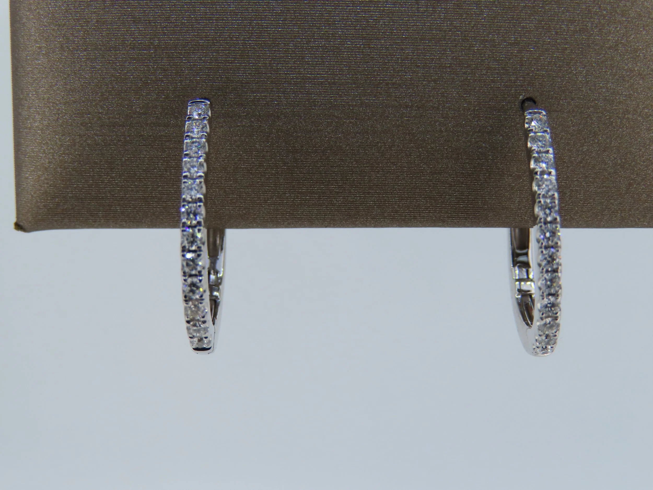 Diamond Oval Hoops - hoop earrings | Greco Jewelers - close-up